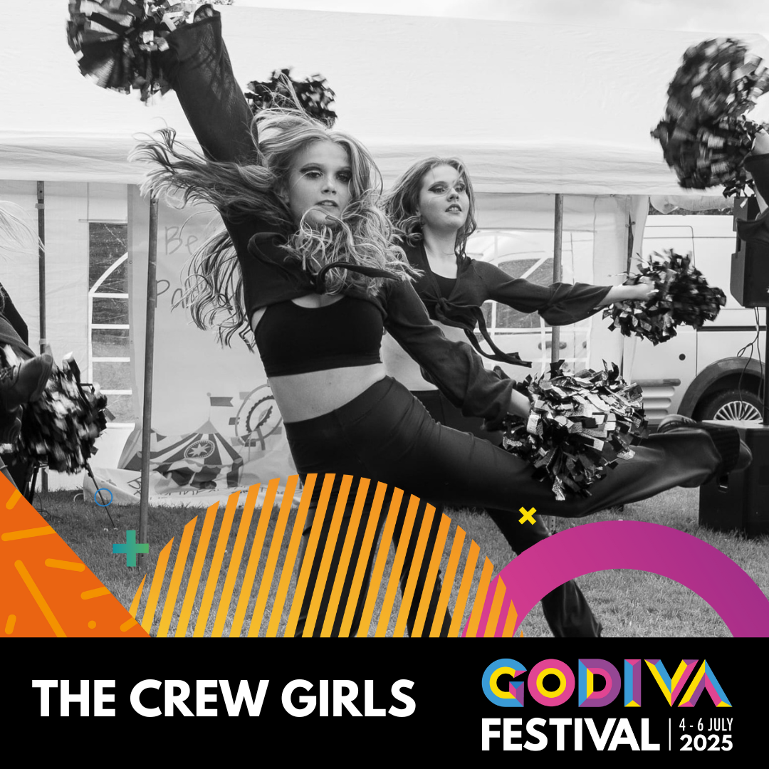 group of girls dancing with cheer poms